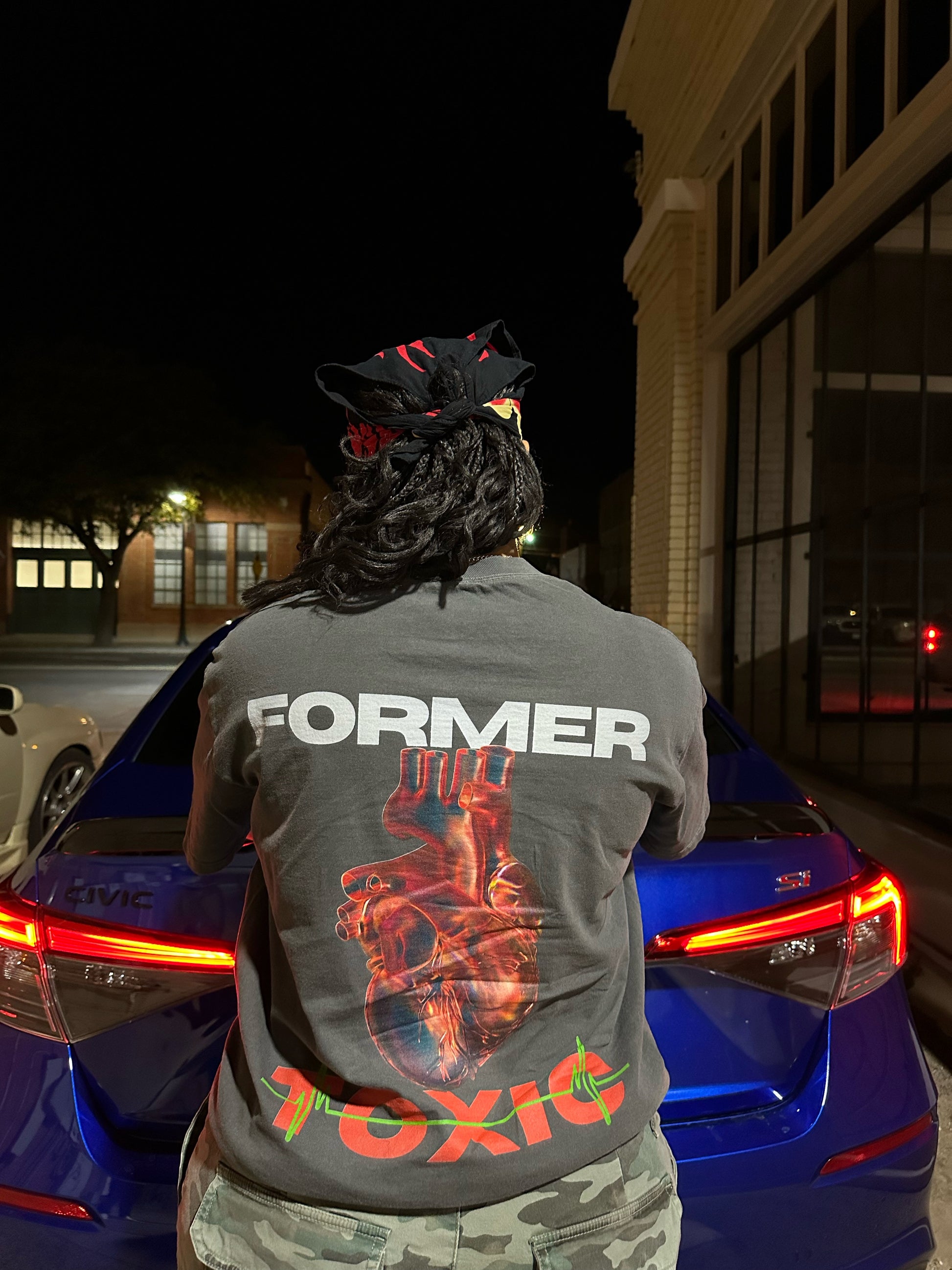 Back of Heat Scan Targeted Heart Tee featuring large thermal heart graphic and Former Toxic logo at night.