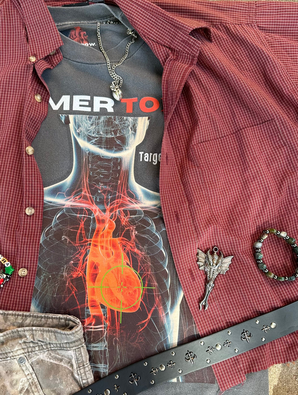 Detailed close-up of thermal heart graphic on Heat Scan Targeted Heart Tee styled with accessories and button-up shirt.